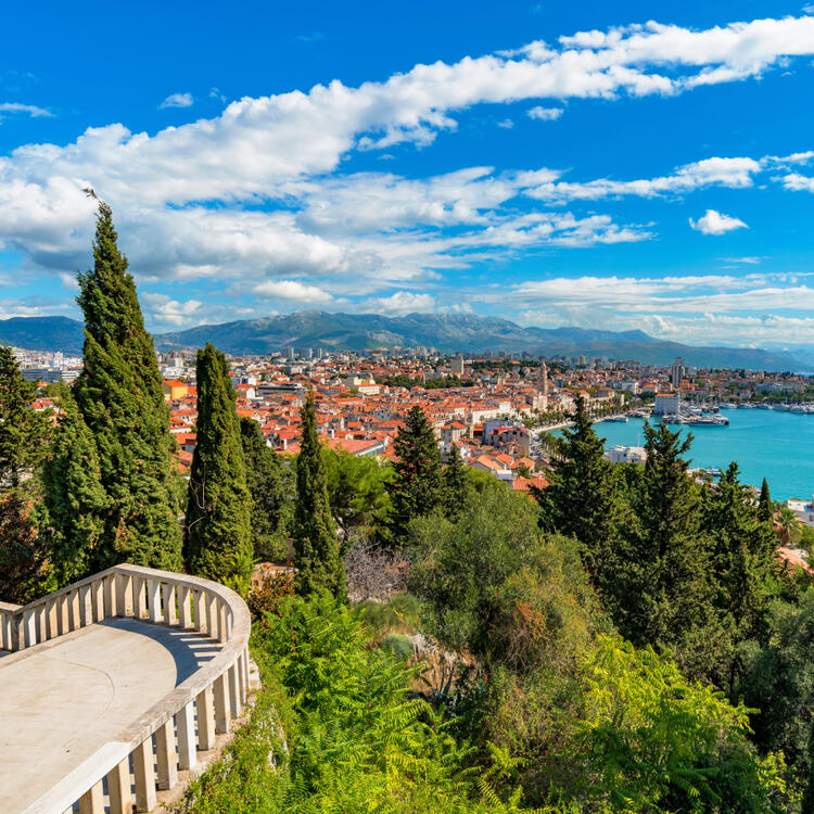 View of the city of Split from Marjanberg with trees and a clear sky