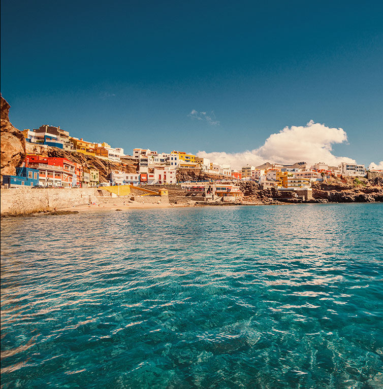 View of a typical village on the island of Gran Canaria from the sea.r 