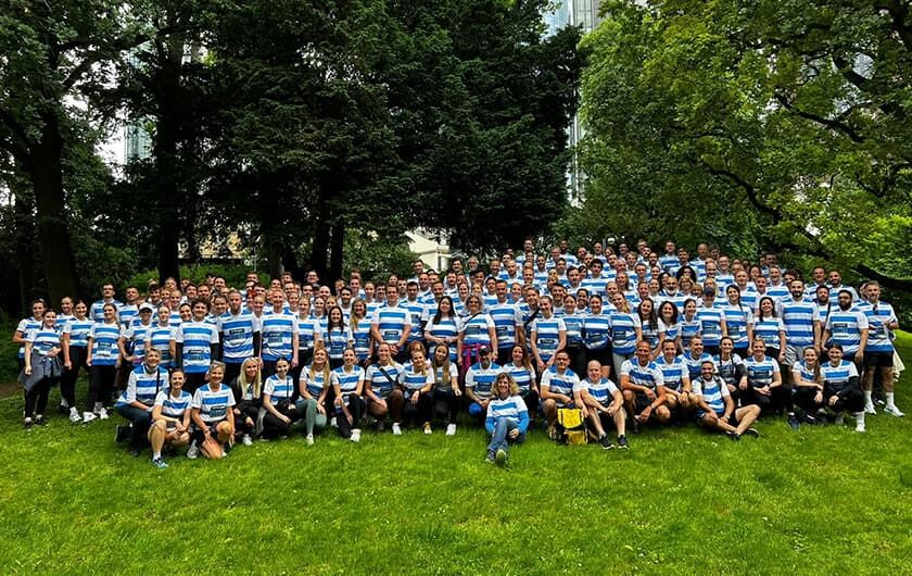 Condor employees in striped sports shirts.