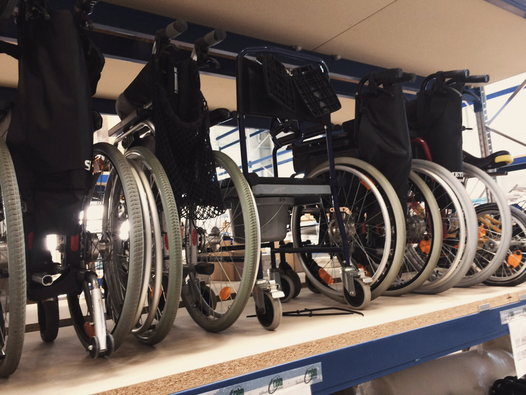 Several wheelchairs on the shelf